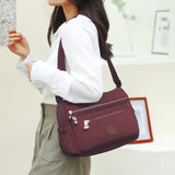 (Buy 1 Get 1 Free) Lightweight Nylon Crossbody Bag – Multi-Pocket, Water-Resistant, Adjustable 🔧