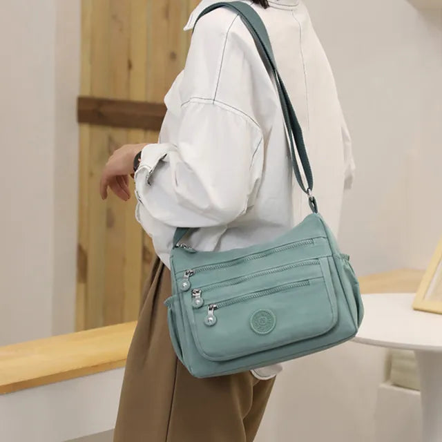(Buy 1 Get 1 Free) Lightweight Nylon Crossbody Bag – Multi-Pocket, Water-Resistant, Adjustable 🔧