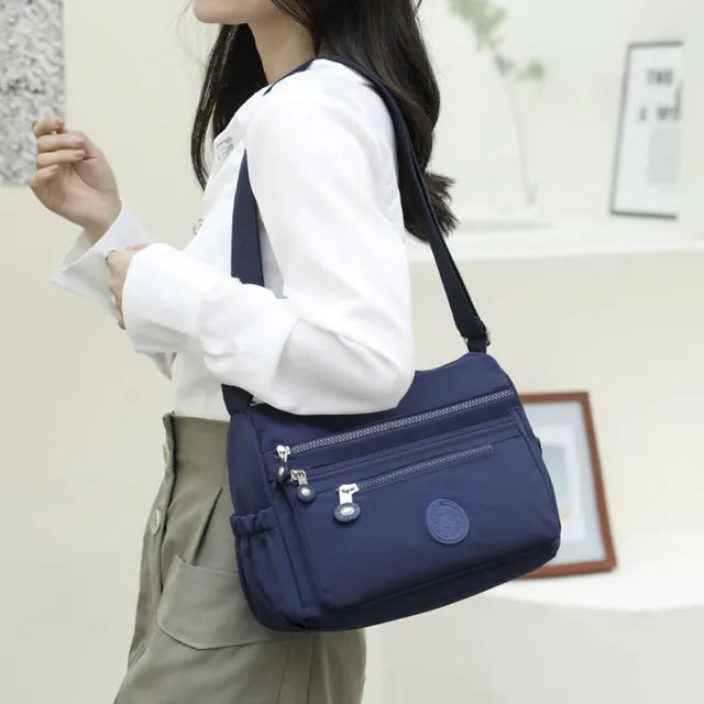 (Buy 1 Get 1 Free) Lightweight Nylon Crossbody Bag – Multi-Pocket, Water-Resistant, Adjustable 🔧