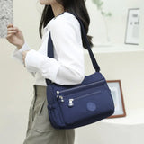 (Buy 1 Get 1 Free) Lightweight Nylon Crossbody Bag – Multi-Pocket, Water-Resistant, Adjustable 🔧