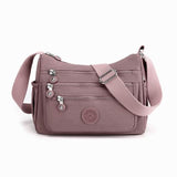 (Buy 1 Get 1 Free) Lightweight Nylon Crossbody Bag – Multi-Pocket, Water-Resistant, Adjustable 🔧