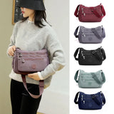 (Buy 1 Get 1 Free) Lightweight Nylon Crossbody Bag – Multi-Pocket, Water-Resistant, Adjustable 🔧
