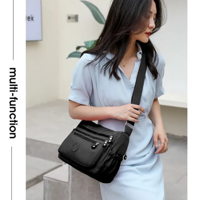 (Buy 1 Get 1 Free) Lightweight Nylon Crossbody Bag – Multi-Pocket, Water-Resistant, Adjustable 🔧