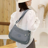(Buy 1 Get 1 Free) Lightweight Nylon Crossbody Bag – Multi-Pocket, Water-Resistant, Adjustable 🔧