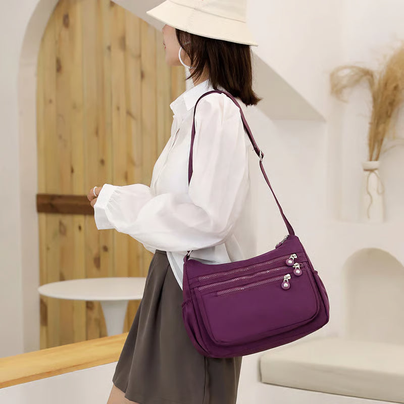 (Buy 1 Get 1 Free) Lightweight Nylon Crossbody Bag – Multi-Pocket, Water-Resistant, Adjustable 🔧